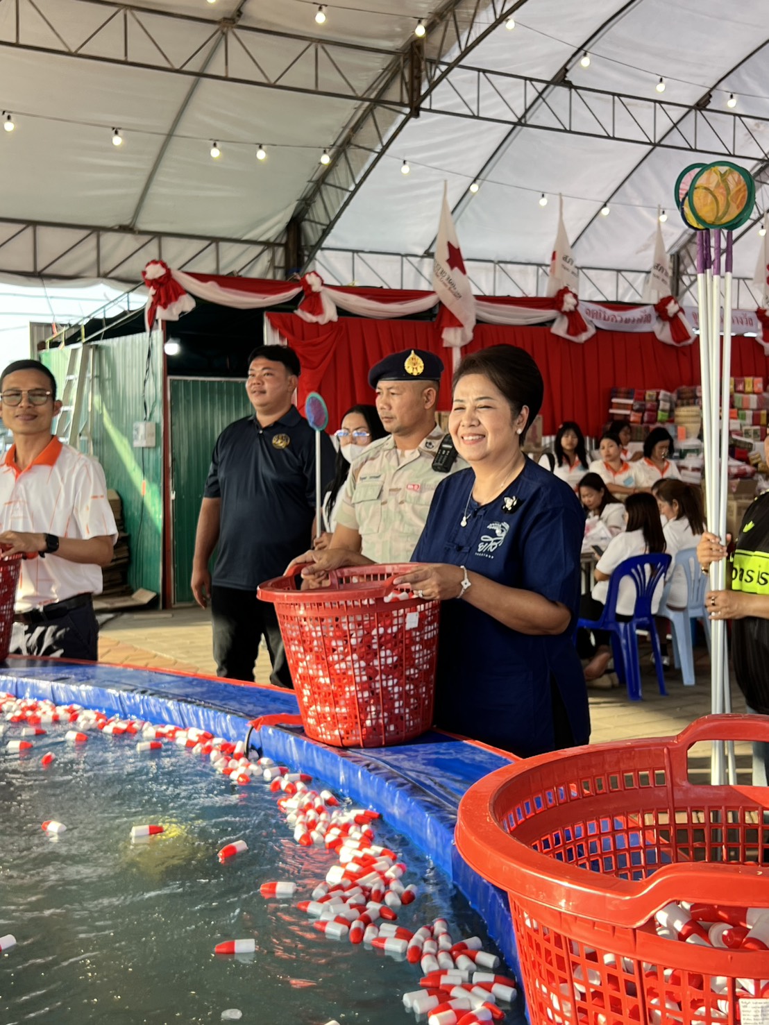 title - ส.ป.ก.ยโสธร ร่วมเป็นสักขีพยานในการมอบรางวัลและร่วมจำหน่ายบัตรกาชาดในงานสถาปนาจังหวัดยโสธร ประจำปี 2569